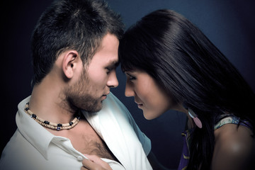 couple in love over dark background