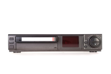 Old Video Cassette Recorder ejecting tape isolated