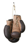 Fototapeta Dmuchawce - Old boxing gloves hanging on a lace