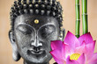 Bouddha, fleur de lotus et bambou