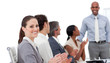 © WavebreakMediaMicro - Positive business people clapping a good presentation