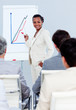 © WavebreakMediaMicro - Charismatic businesswoman doing a presentation