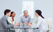 © WavebreakMediaMicro - Serious business people interacting