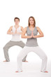 © CandyBox Images - Fitness - Young healthy couple in yoga position