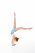 © Monkey Business - Studio Portrait Of Young Female Gymnast