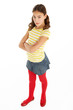 © Monkey Business - Studio Portrait Of Defiant Young Girl