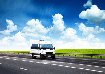 van on road and perfect summer day