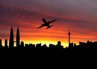 Wall Mural - plane departing Kuala Lumpur at sunset illustration