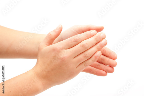 Fotografía Clapping! Female hands clapping on white