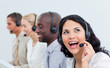 © WavebreakMediaMicro - Animated businesswoman and her team working in a call center