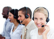 © WavebreakMediaMicro - Blond businesswoman and her team working in a call center