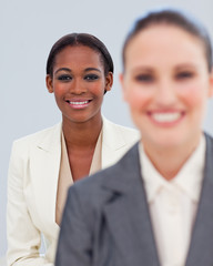 Portrait of two smiling businesswomen