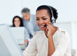 © WavebreakMediaMicro - Confident businesswoman talking on headset