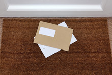 Envelopes On The Doormat