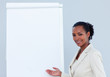 © WavebreakMediaMicro - Positive businesswoman giving a presentation