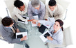 © WavebreakMediaMicro - Smiling international business people shaking hands