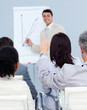© WavebreakMediaMicro - Senior businessman asking a question at a presentation