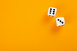 dice on orange background