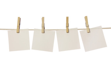 Wall Mural - Four white blank notes hanging on the clothesline