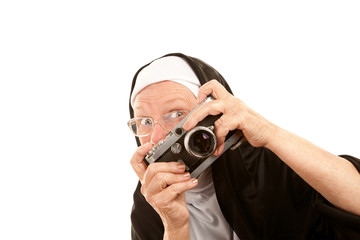 Funny nun with camera