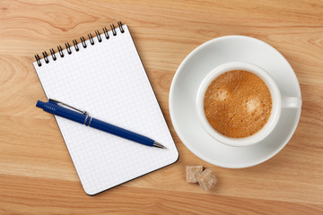 Wall Mural - Blank notepad with pen and cappucino cup