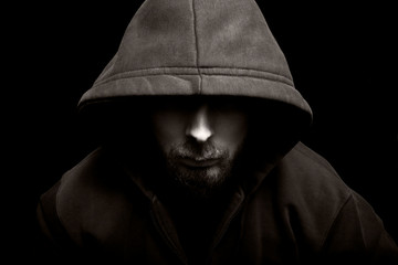 Canvas Print - Scary evil man with hood in the dark