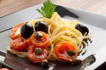 Canvas Print - pasta Sicily recipe with fresh tomatoes black olive and caper