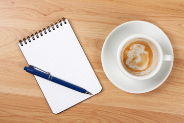 Wall Mural - Blank notepad with pen and empty coffee cup