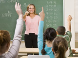 Fototapeta  - Students answering teacher question