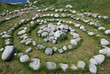 magic Celtic spiral of life made of pebble rocks in nature