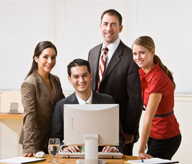 Wall Mural - Business people looking at computer