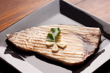 Sticker - grilled swordfish on wood background