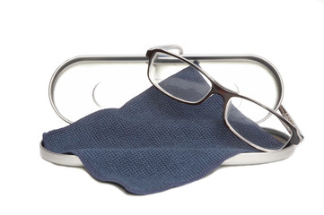 Eyeglasses in silver case isolated