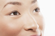 © moodboard - young asian woman's face looking up