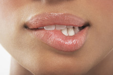 Woman Biting Lip