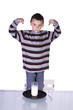 © Mehmet Dilsiz - Little Boy Showing His Muscles