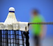 Badmintonball auf Netzkante