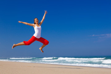 Wall Mural - young woman jumping