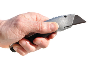 Hand Holding Utility Knife