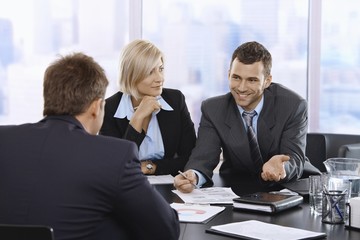 Canvas Print - Businessman smiling at meeting