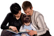 © DenisNata - Happy family reading a book