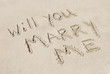 Will You Marry Me Written In Sand