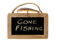 Fishing Lure On Top Of Gone Fishing Sign
