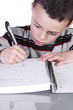 © Mehmet Dilsiz - Little Cute Boy Practicing His Writing Skills