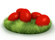 Red Easter eggs in grass