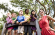 © Kablonk Micro - Preschool children playing on playground with teacher