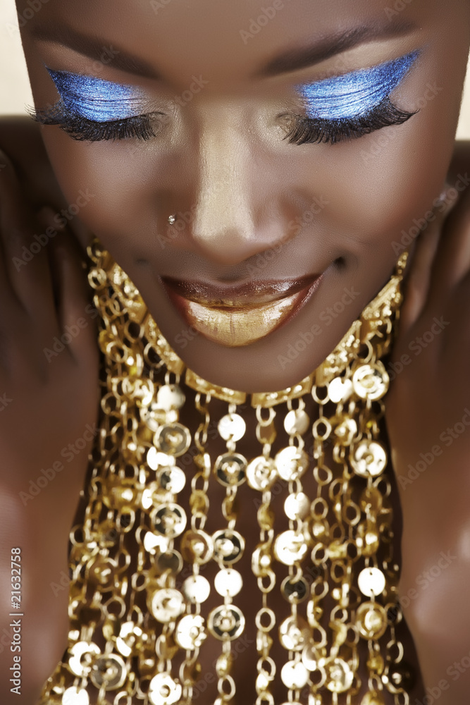 African woman with gold Stock Photo | Adobe Stock