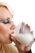 beautiful woman with a glass of milk (white background)