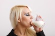 beautiful woman with a glass of milk (closed eyes)