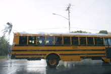 Blurry Motion Road With Yellow School Bus, Hurricane Storm Rain